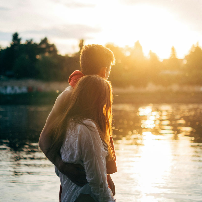 Couple overlooking water