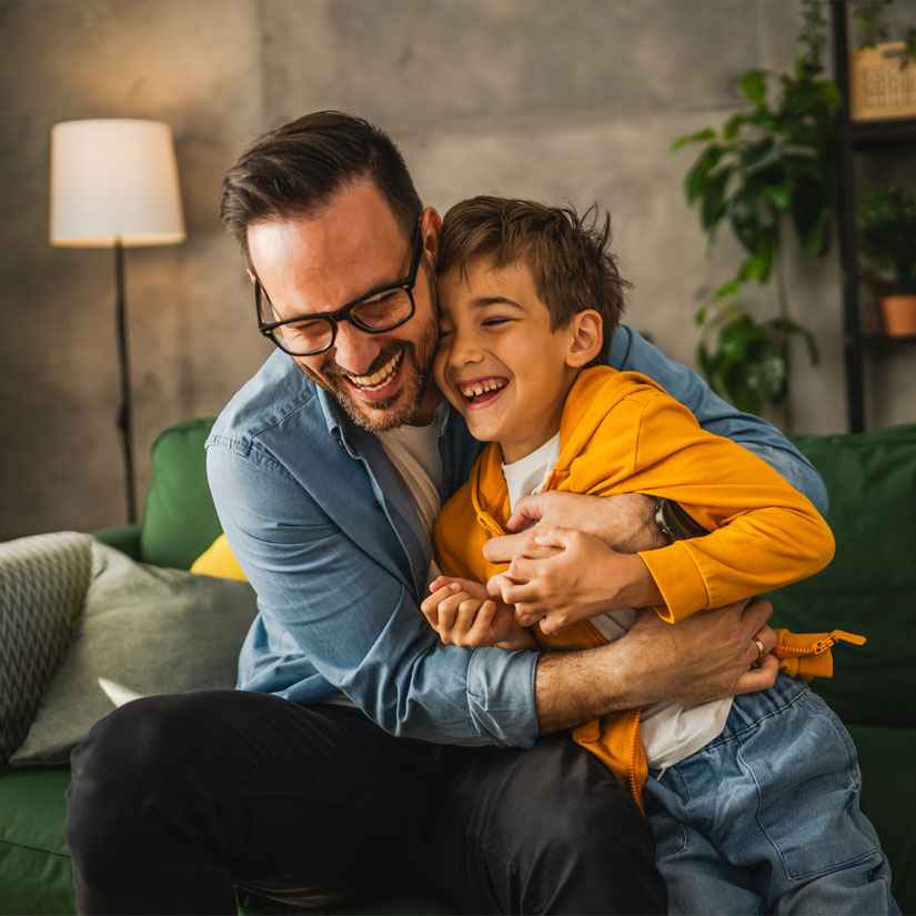 A father playing with his son